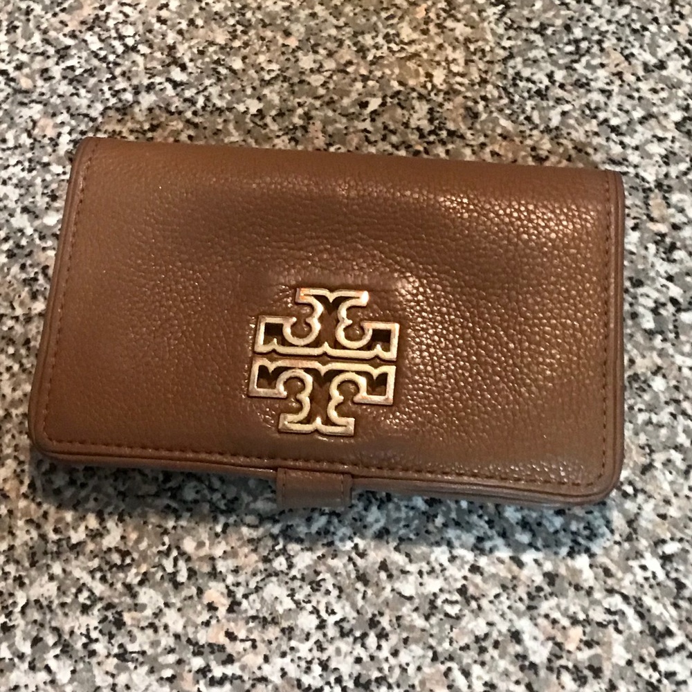Tan Tory Burch wallet in used condition